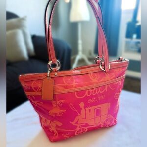 Coach Hot Pink / Orange Carriage/Horse hand bag LOVELY